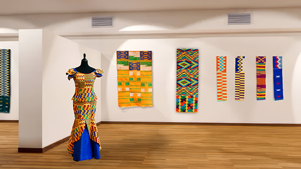 Gallery installation view of handwoven Kente textiles from Ghana displayed on white walls, with a mannequin wearing a patterned peplum blouse and long skirt