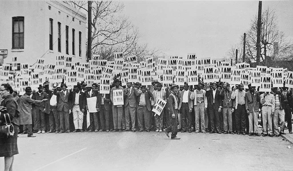 Art Shay, Man walking though Memphis with a sign reading I AM A Man, Memphis, TN, 1968; photograph, 16 1/2 x 11 1/16 inches; © 2019 Art Shay Archive Projects ll