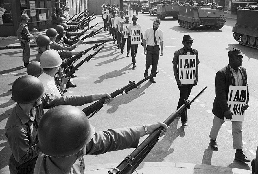 Ernest Withers, Sanitation workers assemble in front of Clayborn Temple for a solidarity march. I Am A Man was the theme for Community On the Move for Equality